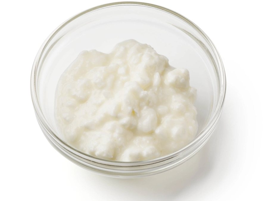 Cottage cheese prepared for a baby