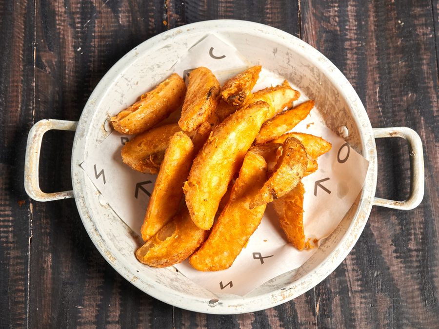 Smoky roasted sweet potato wedges with lime yogurt dip